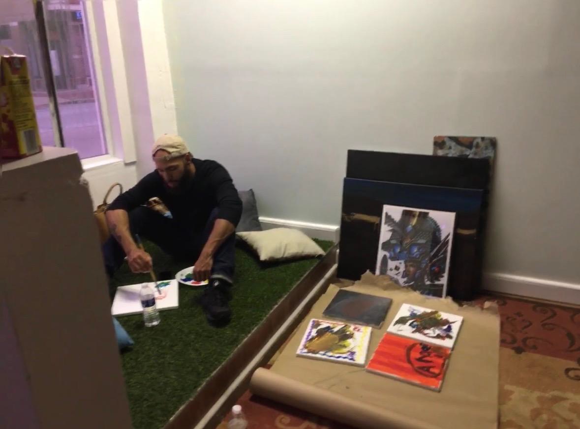 Artist painting live at LongHouse